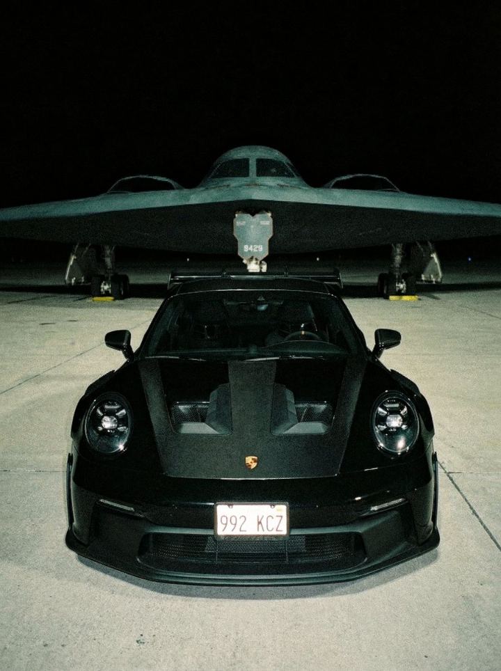 Private jet on the tarmac at night